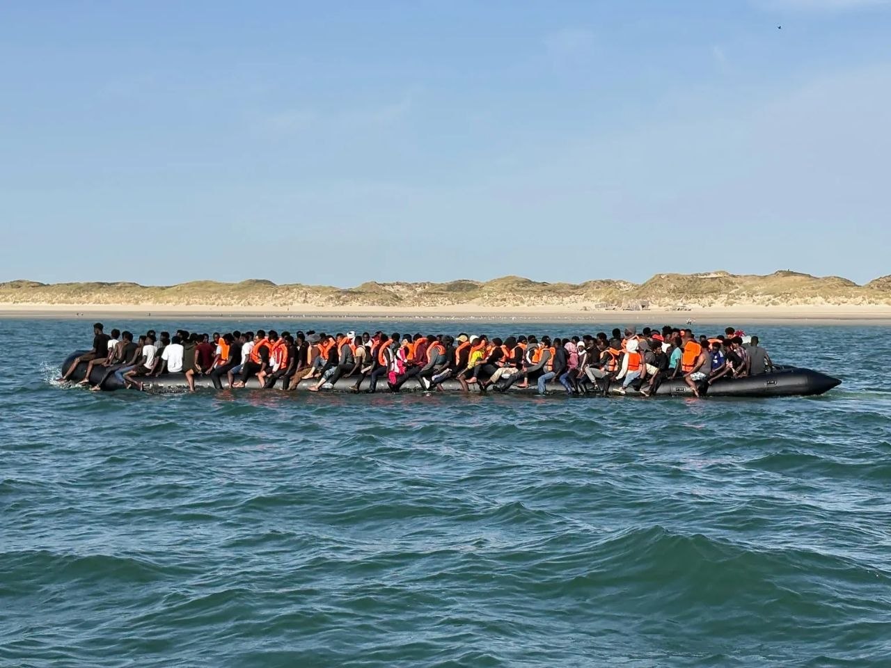 Record 230 migrants on single boat bound for Britain