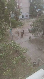 Woman in Kamensk kneels before TCC representatives, asks them not to mobilize her husband