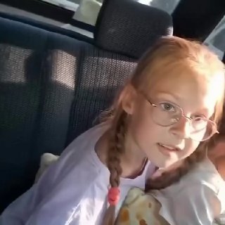 In Ukraine children pray in a car while drunk TCC officials stand behind